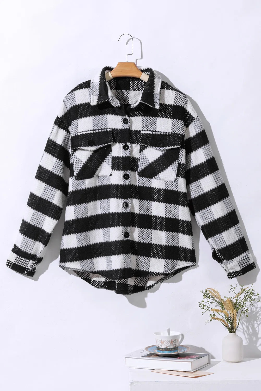 Black-and-white plaid long-sleeve button-up jacket with front buttons and collar