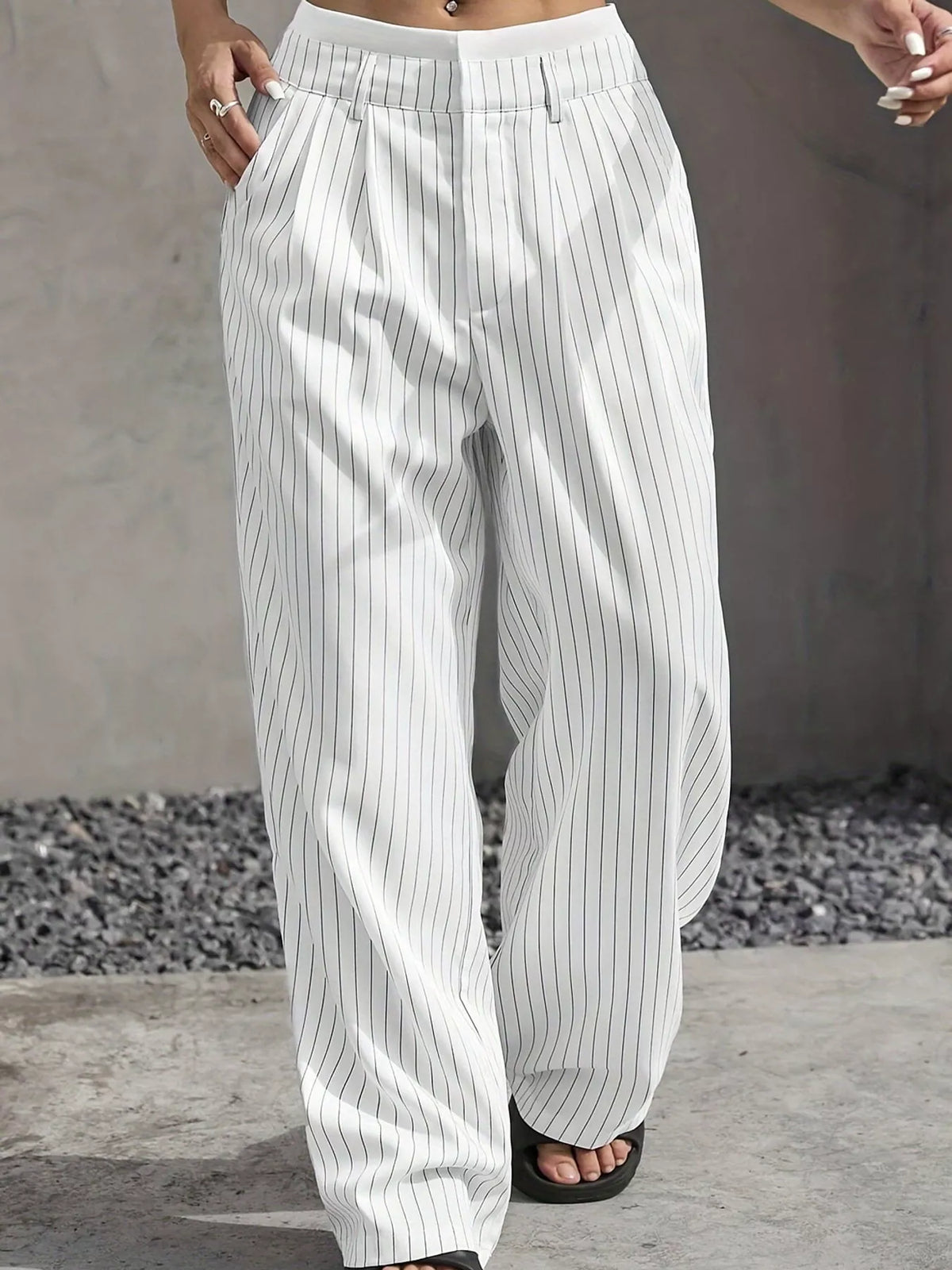 White pinstriped high-waist wide-leg pants with elastic waistband