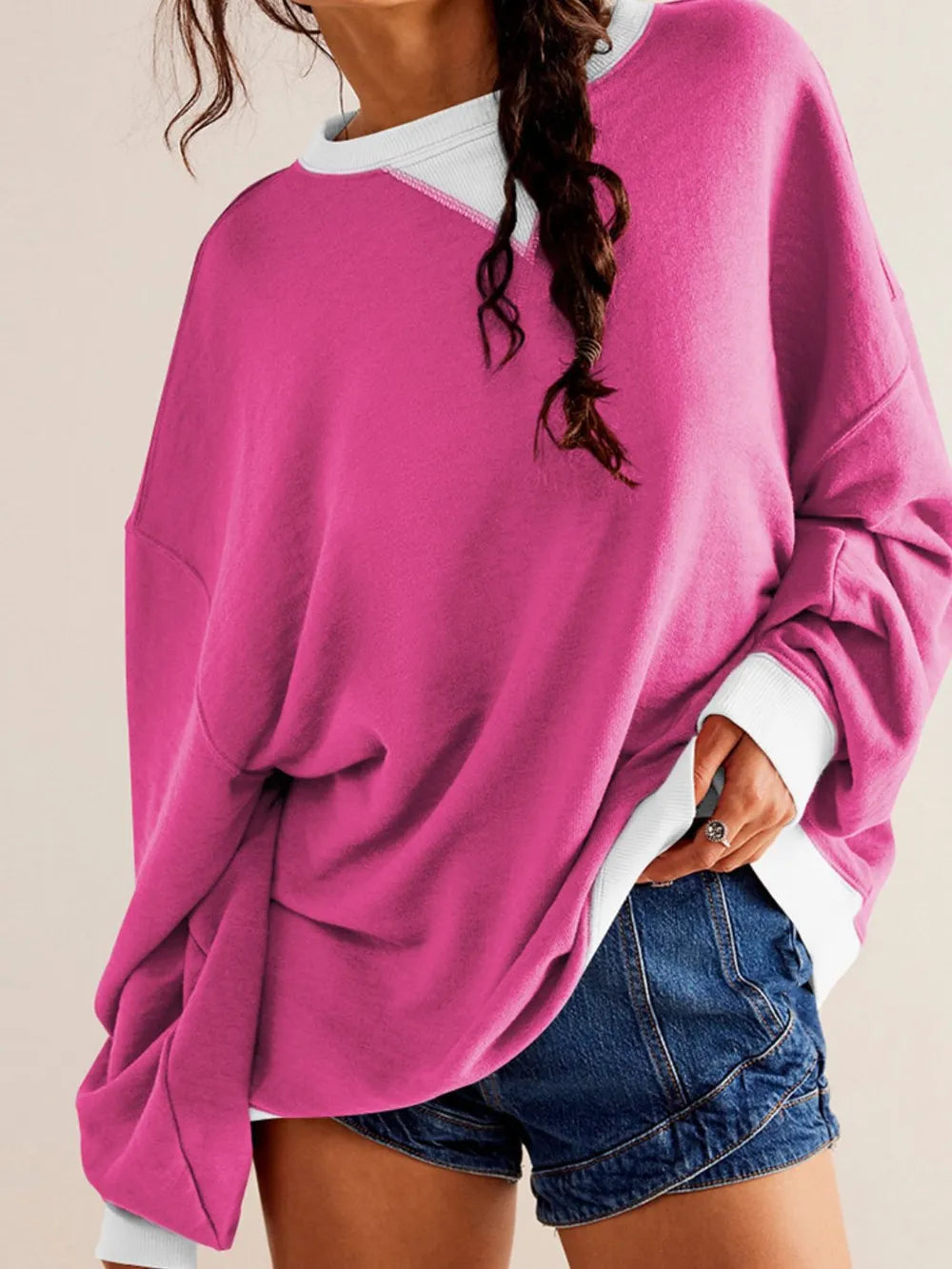 Deep rose round-neck long-sleeve sweatshirt with white contrast neckline and hem trim