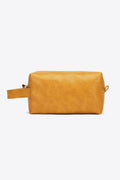 Caramel vegan leather makeup bag with top zipper and side handles