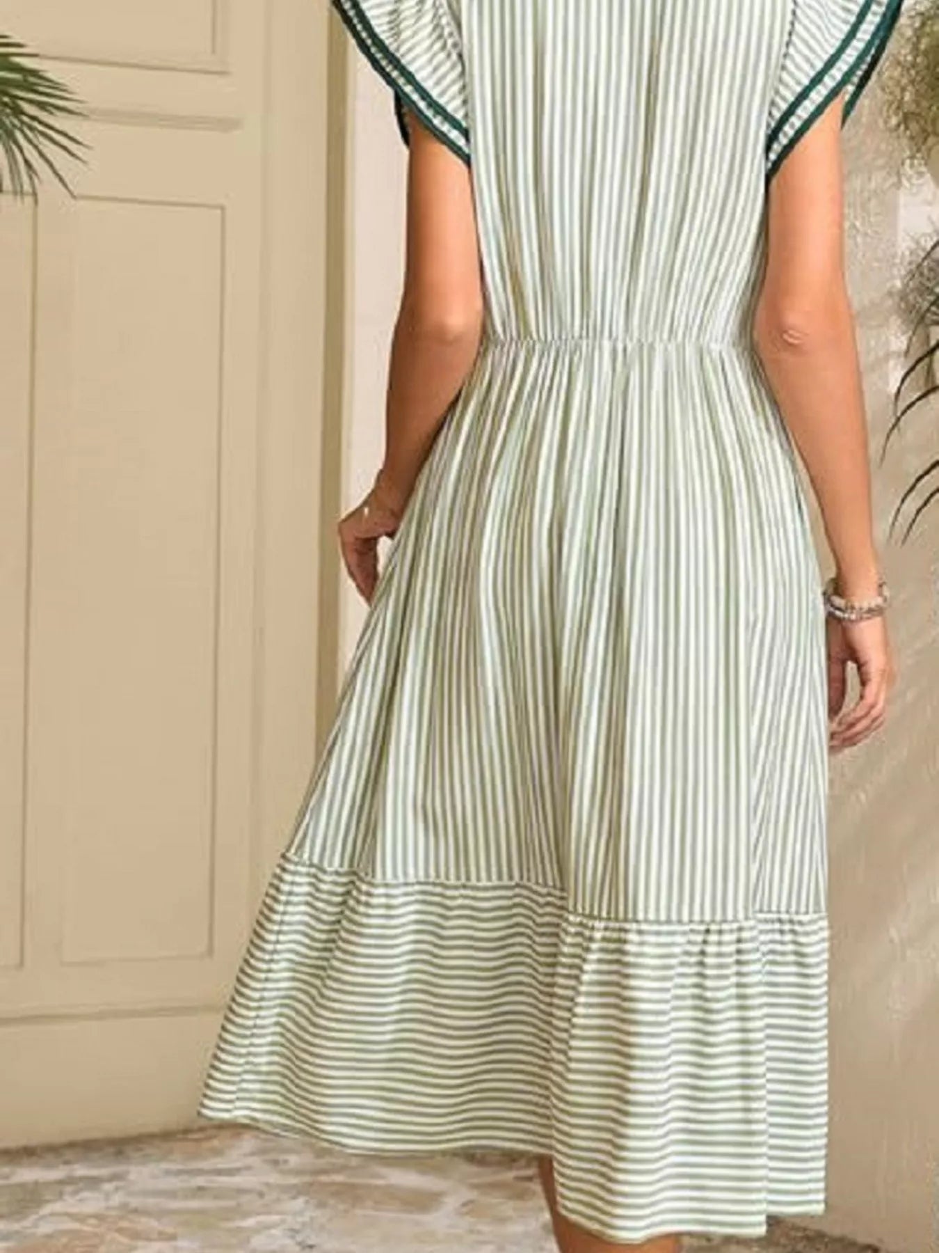 Striped Notched Ruffle Sleeve Dress by Trendsi, back view in pale blue/white stripes