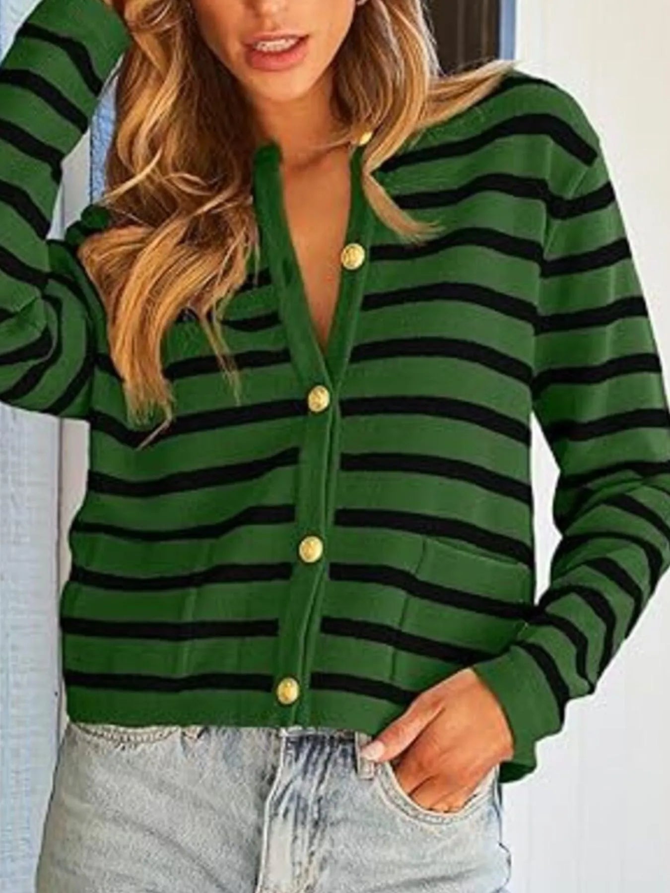 Green-and-black striped button-up cardigan with long sleeves and gold button front