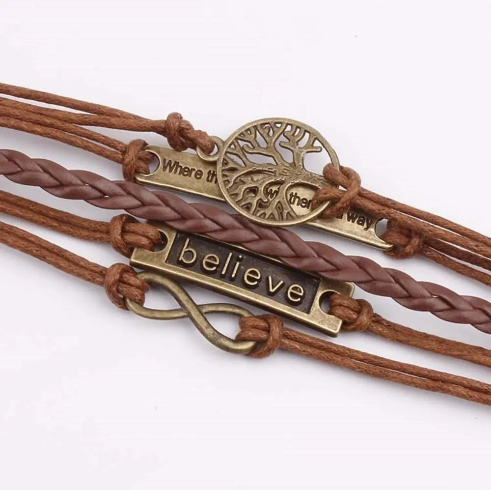 Brown vegan leather rope bracelet with bronze tree charm and 'Believe' bar