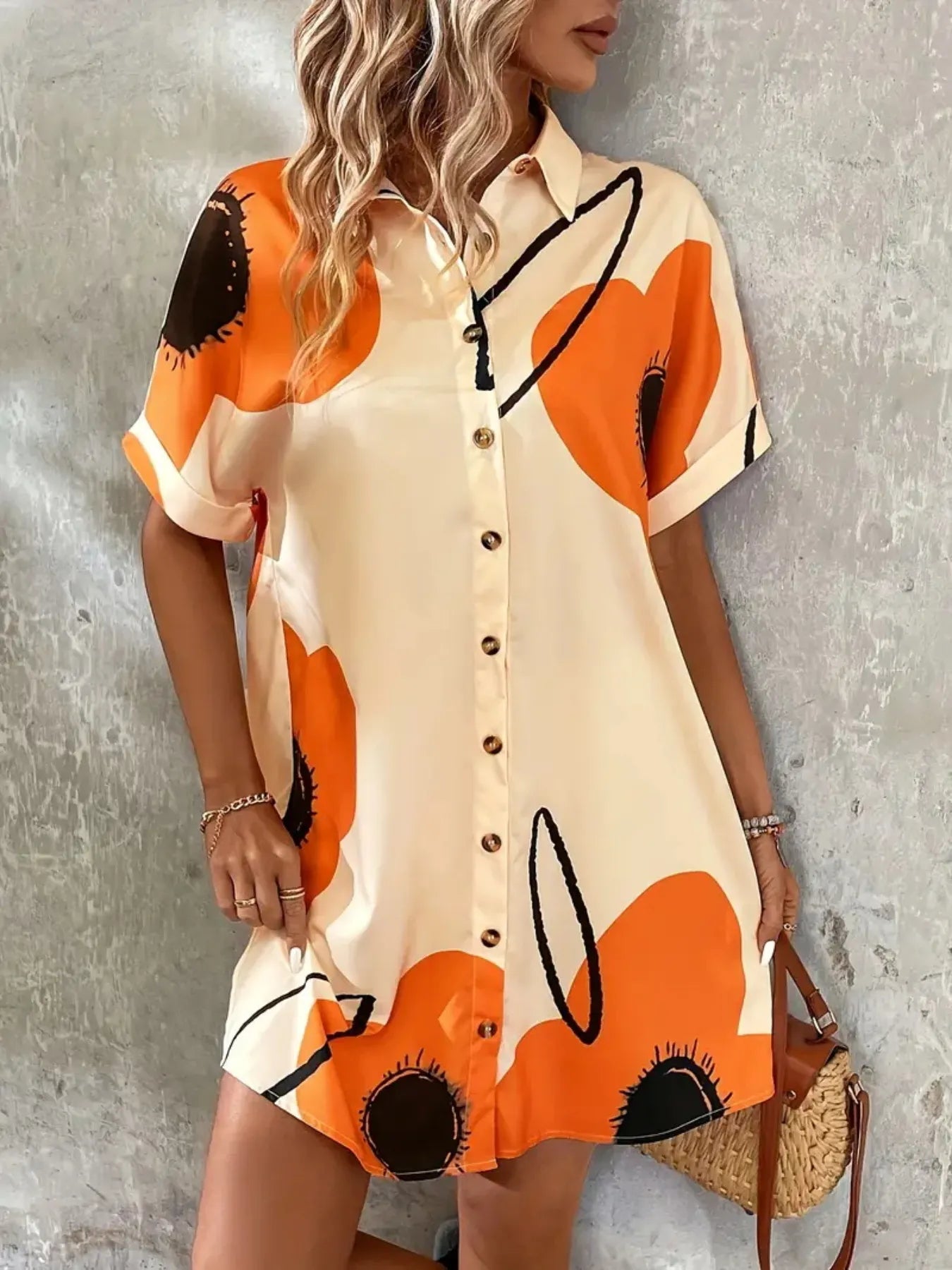 Printed button-front shirt dress in beige with orange abstract print and brown buttons