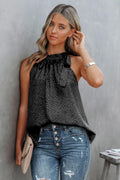 Black printed Grecian neck tank with tied high neckline and sleeveless drape