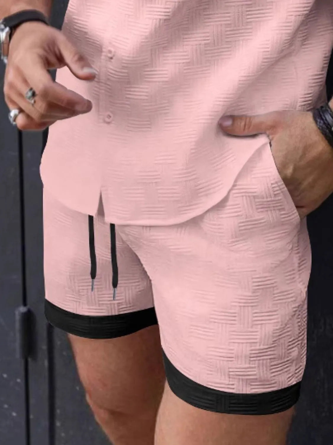 Men's drawstring textured shorts, blush pink with black trim and side slit