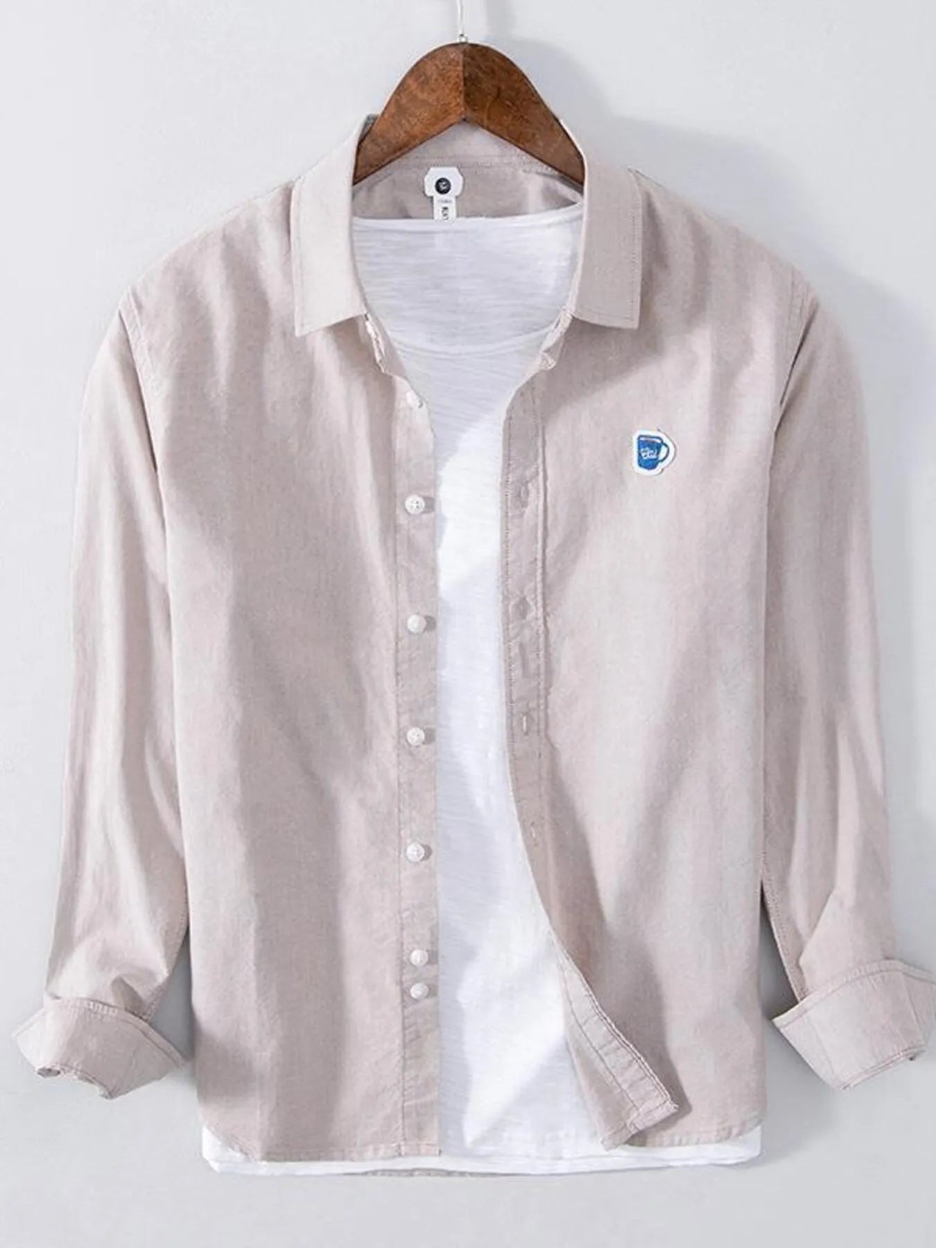 Plus size button-up long sleeve shirt, light khaki with white front placket and blue logo