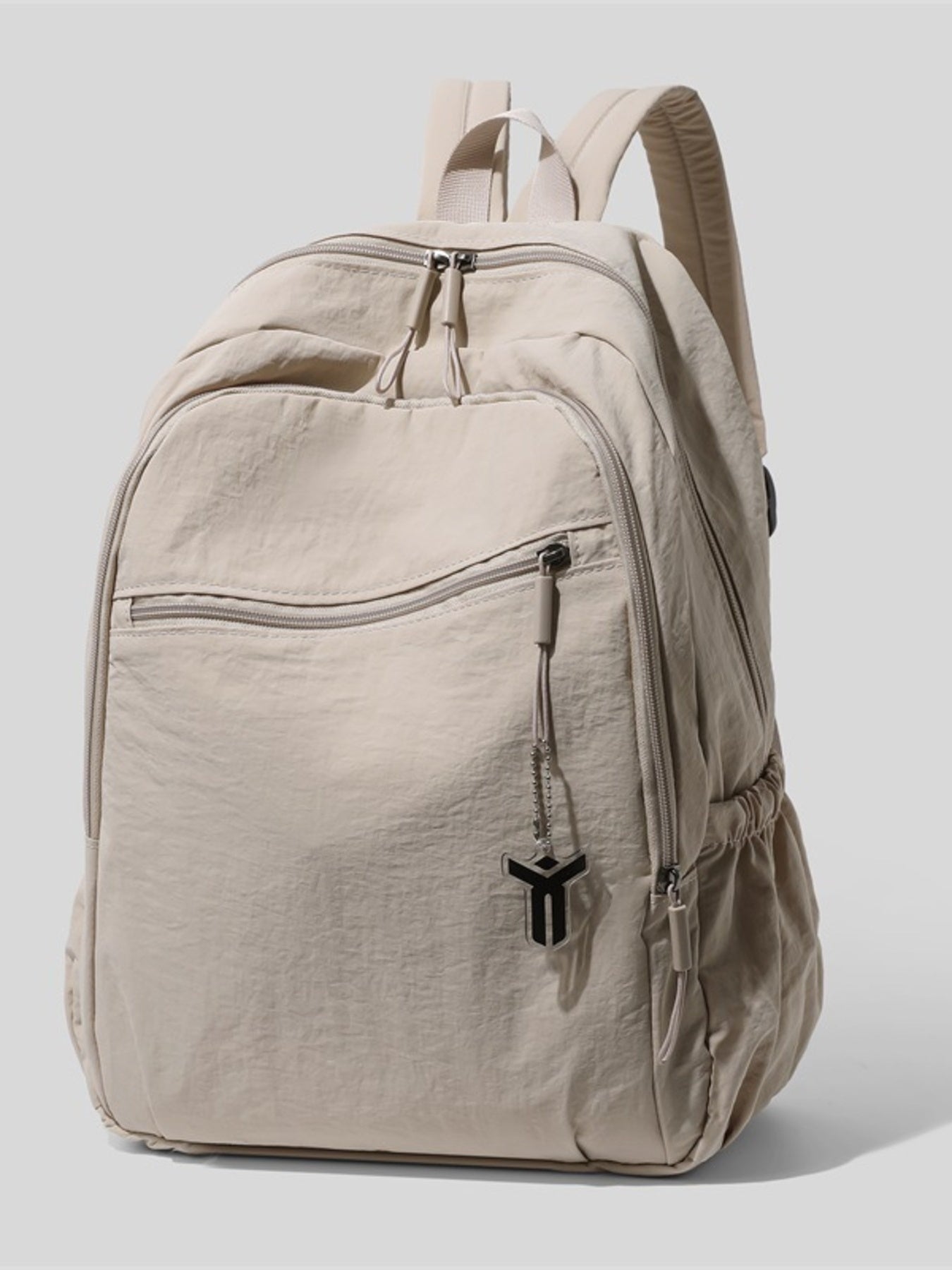 Cedar & Moore lightweight beige nylon backpack by Trendsi