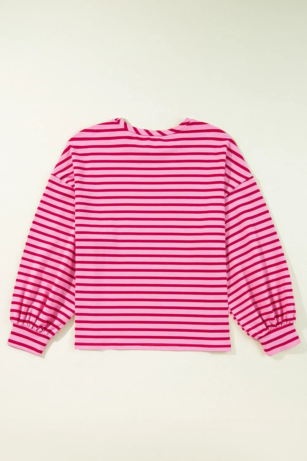 Fuchsia pink striped sweatshirt back view, long sleeves and round neck