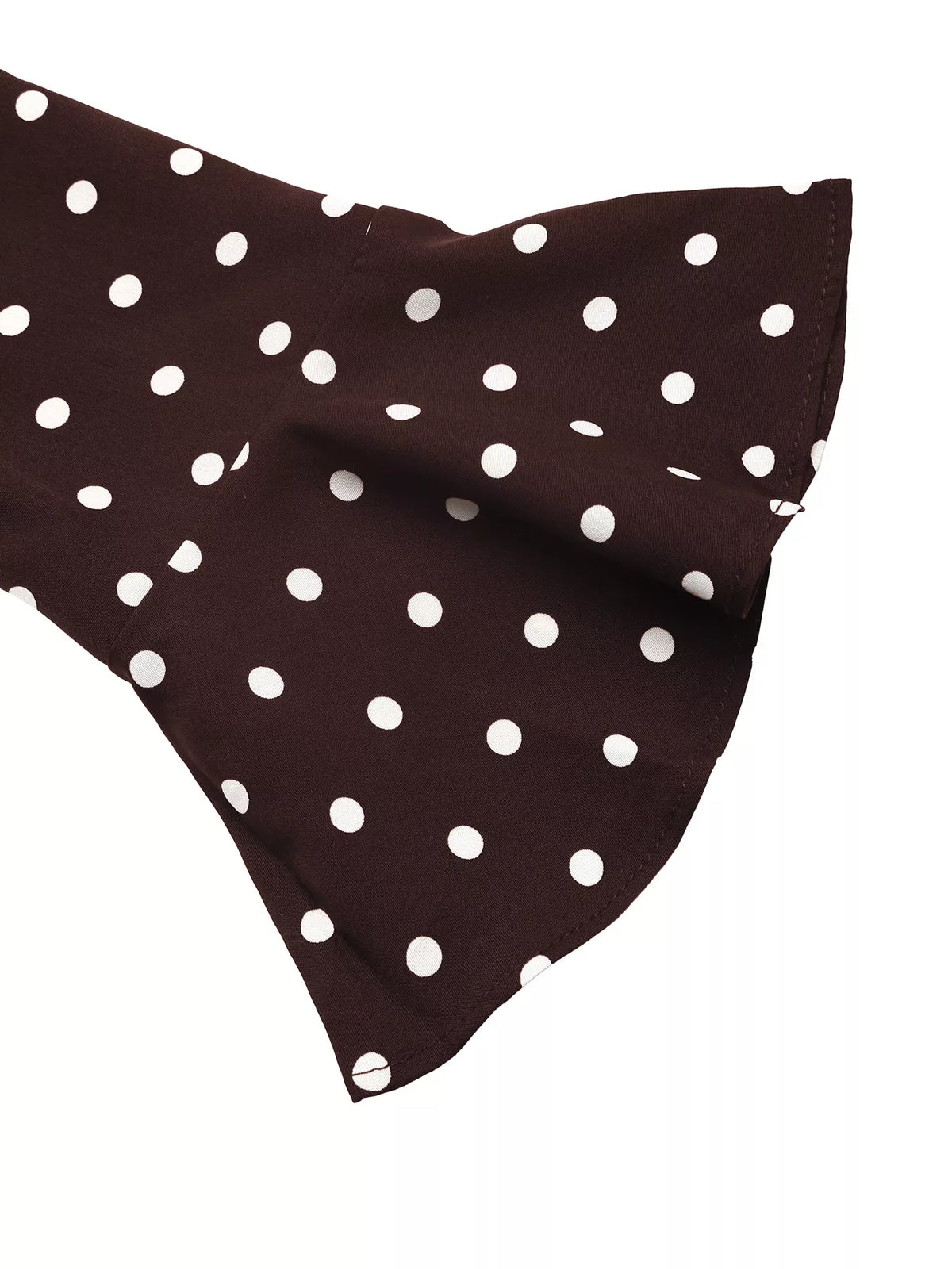 Coffee brown polka dot long sleeve shoulder close-up with flared cuff