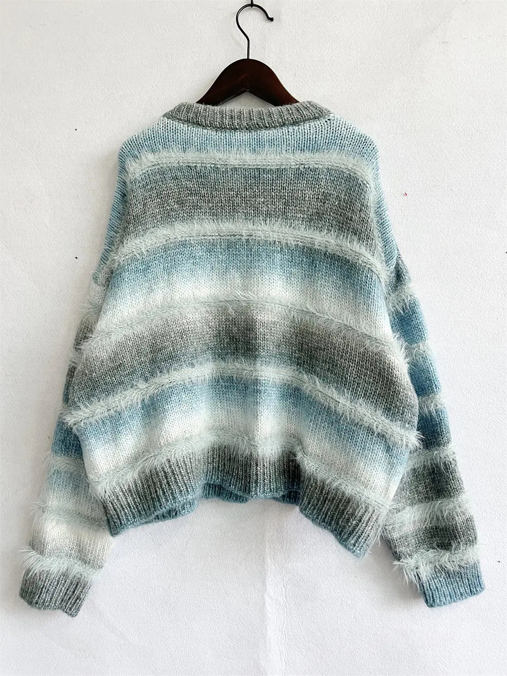 Light blue and gray striped round-neck long-sleeve sweater, relaxed fit with ribs
