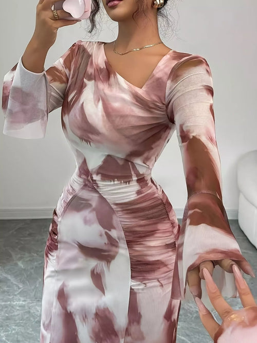 Pink-and-red swirl print maxi dress with asymmetrical neckline and long flared sleeves