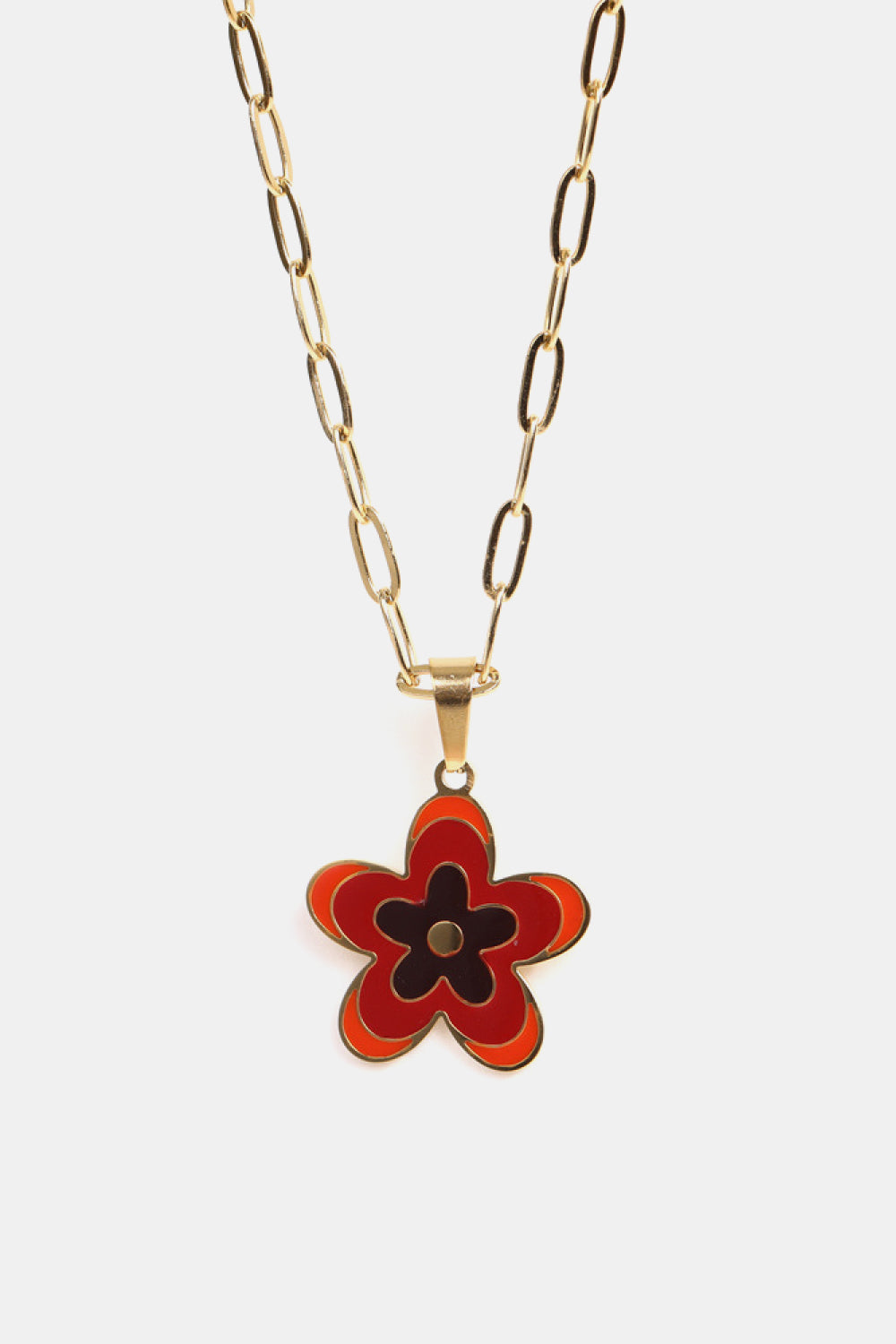 Gold-tone flower pendant necklace with red and black enamel petals