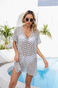 Openwork short cover-up with V-neck and short sleeves, white with dark speckle pattern