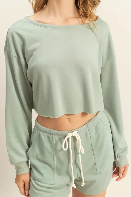 Sage green boat-neck long-sleeve cropped top with wide neckline
