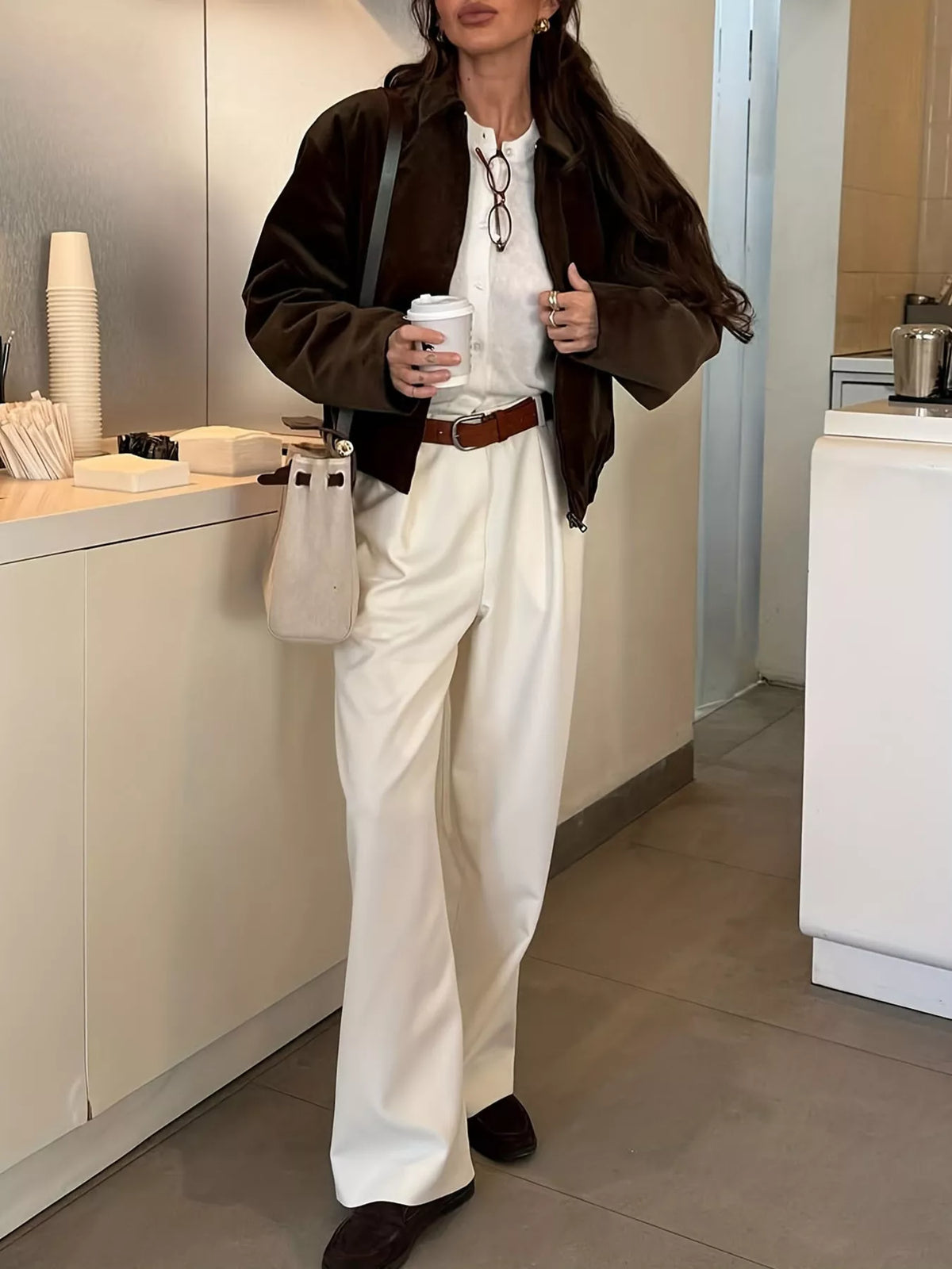 Brown corduroy zip-up jacket, relaxed fit, collared neckline, front zip closure