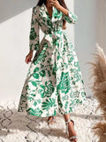 Green floral belted midi dress with V-neck and 3/4 sleeves, gathered waist