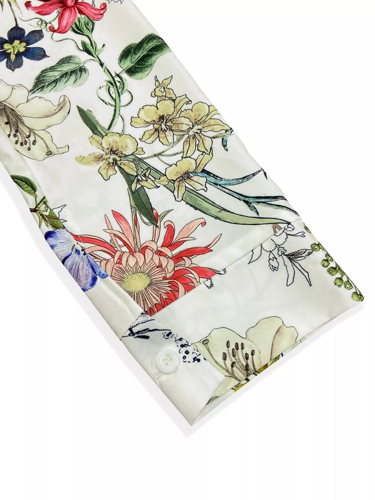 White floral button-down blouse sleeve cuff and button placket, straight hem