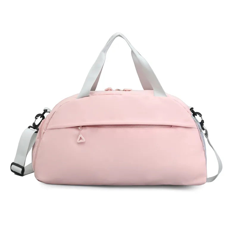 Large nylon travel duffle bag, blush pink with front zip pocket and side straps
