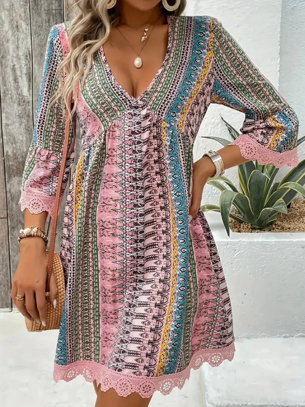 Printed V-neck dress with lace trim, blush-pink and teal stripe pattern, 3/4 sleeves