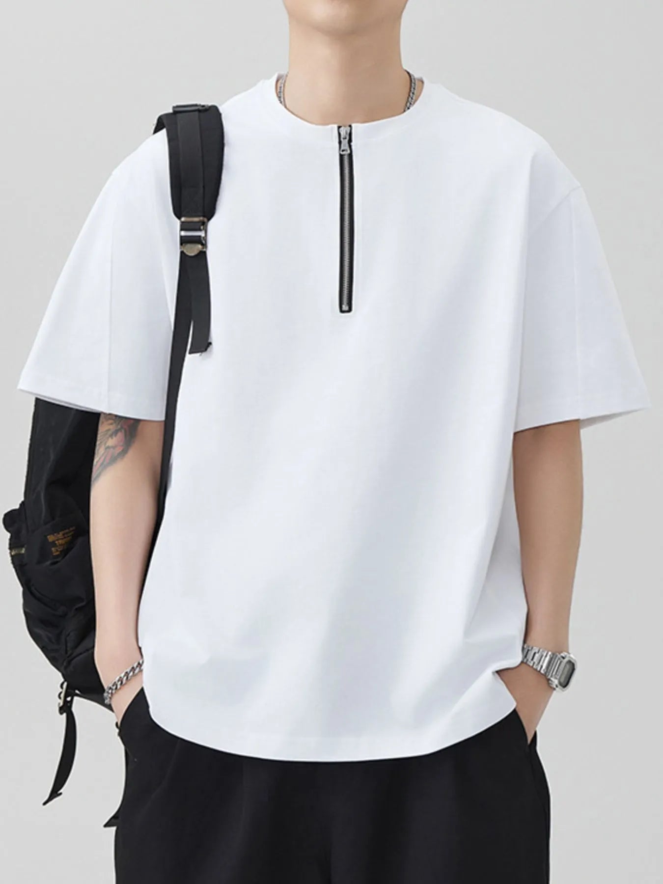 White oversized half-zip T-shirt, short sleeves with front zipper