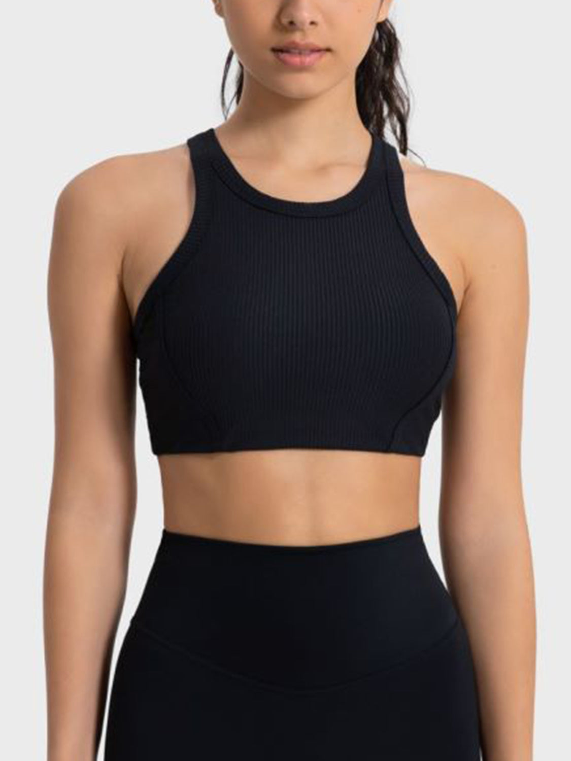 Black cropped sport tank with wide straps and ribbed knit fabric