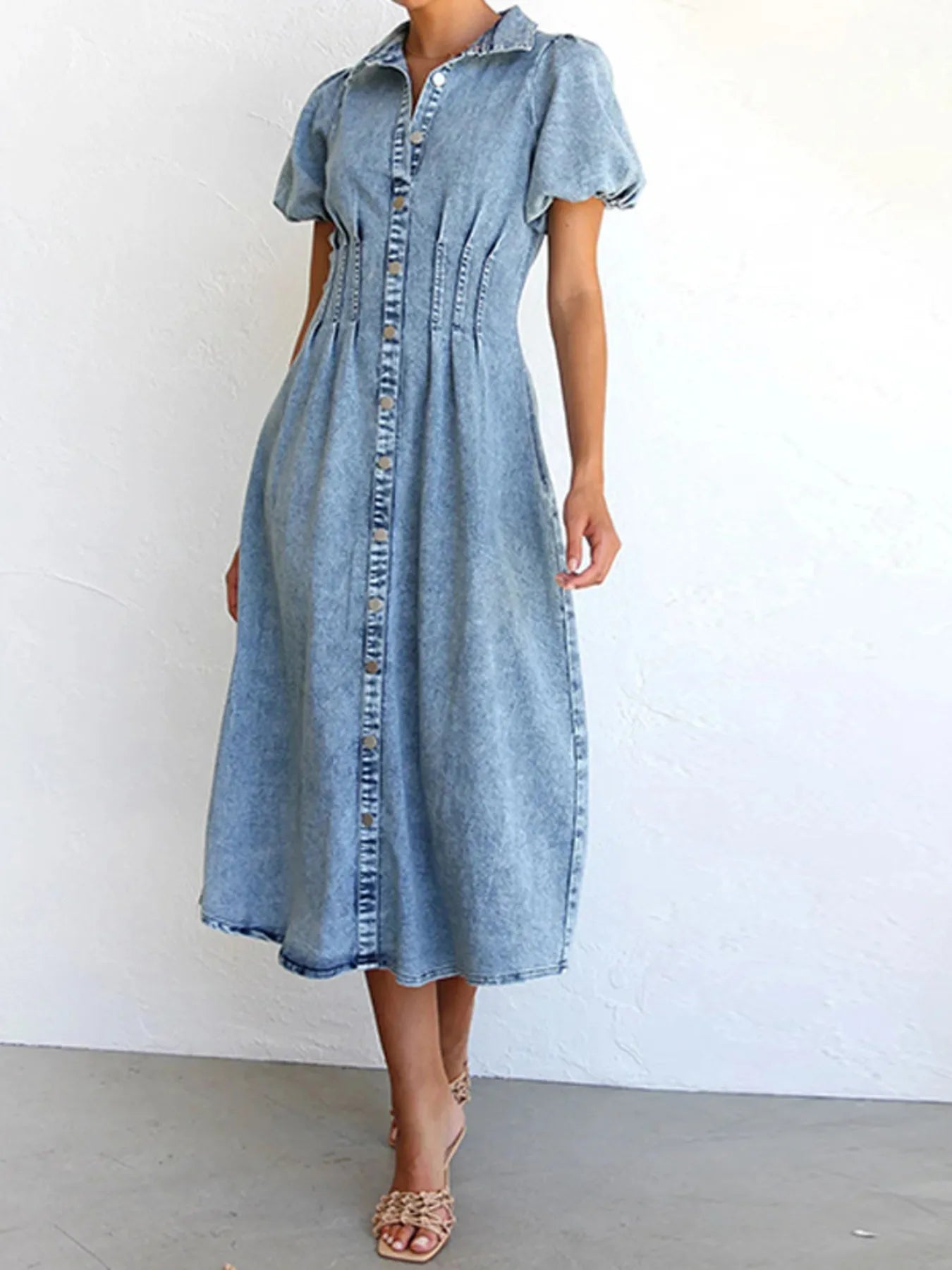 Blue denim midi dress with puff sleeves and vertical button placket, gathered waist