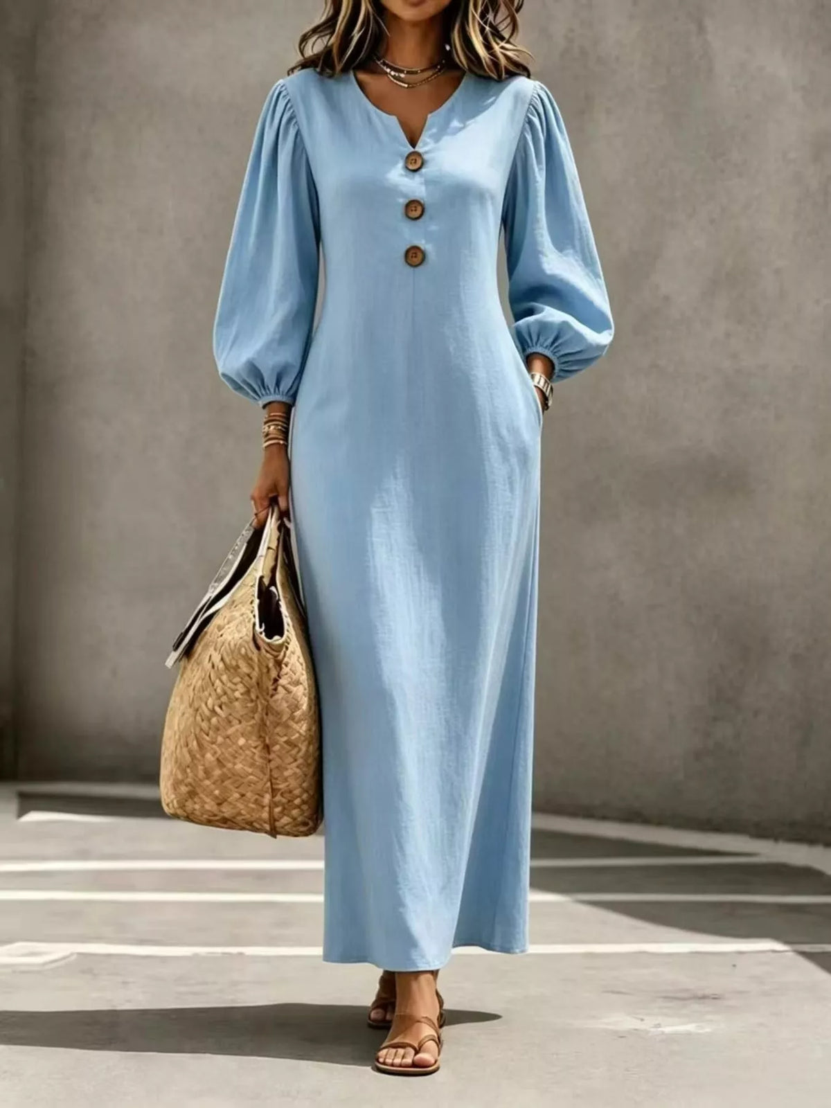 Light blue button-front maxi dress with puff sleeves and V-neck