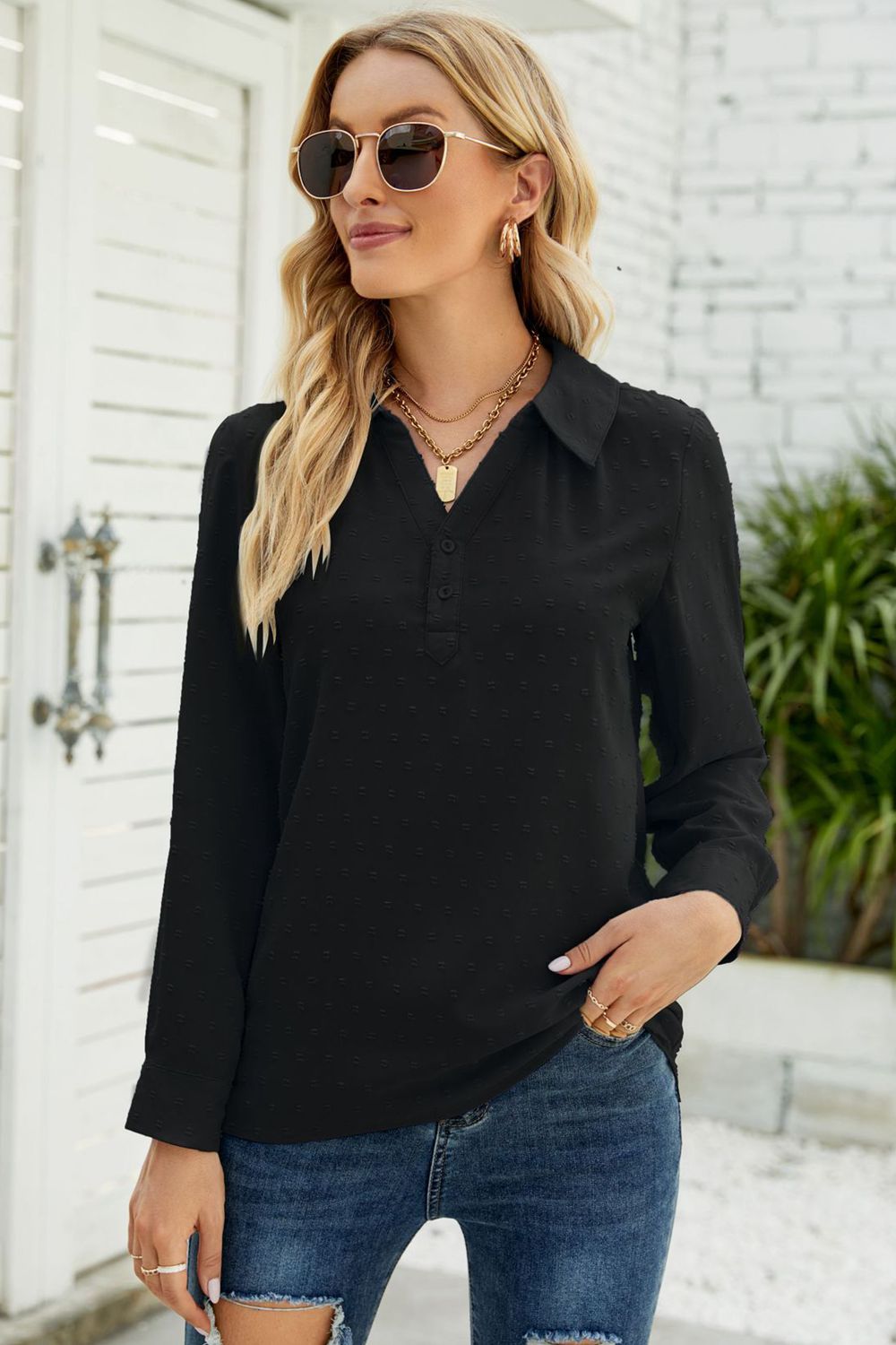 Black swiss dot blouse with Johnny collar and button front, long sleeves