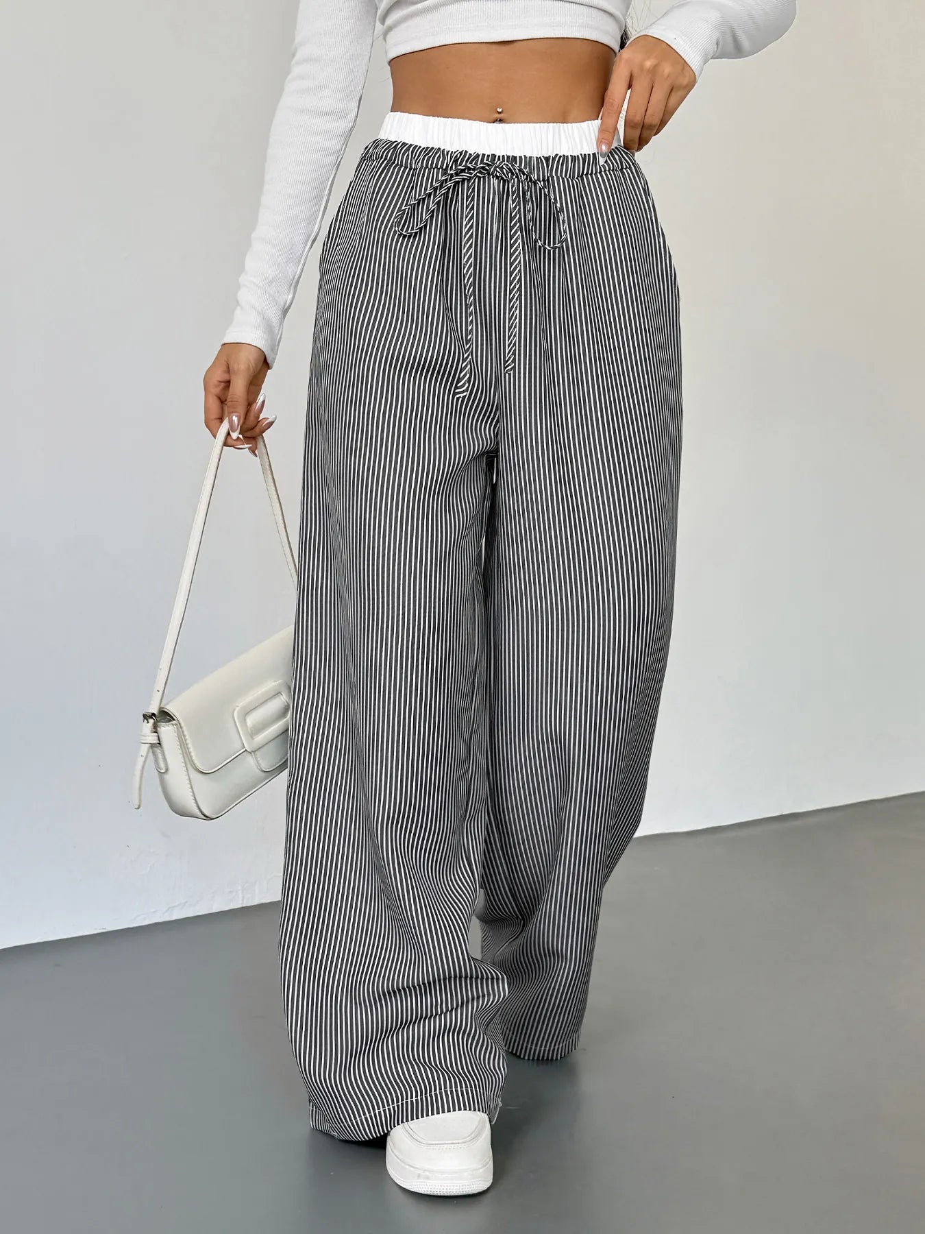 Striped wide-leg drawstring pants, elastic waist and tied drawstring, black and white stripes