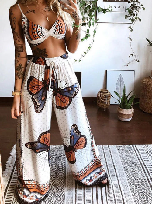 Two-piece boho top and pants set with white base and orange-blue butterfly print