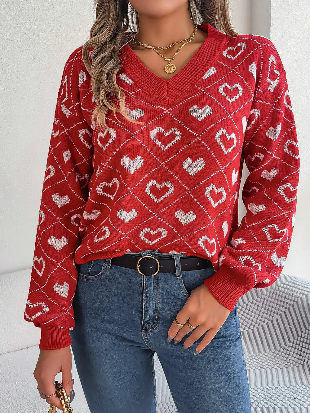 Deep red heart-pattern V-neck long-sleeve sweater with ribbed cuffs and hem