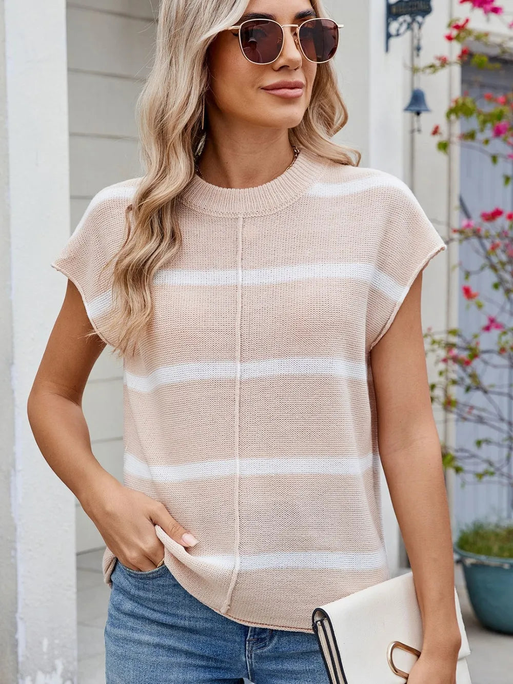 Beige striped knit top with ribbed round neck and exposed center seam, short sleeves