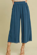 Blue wide-leg pants with elastic waistband and frayed hem, linen-blend
