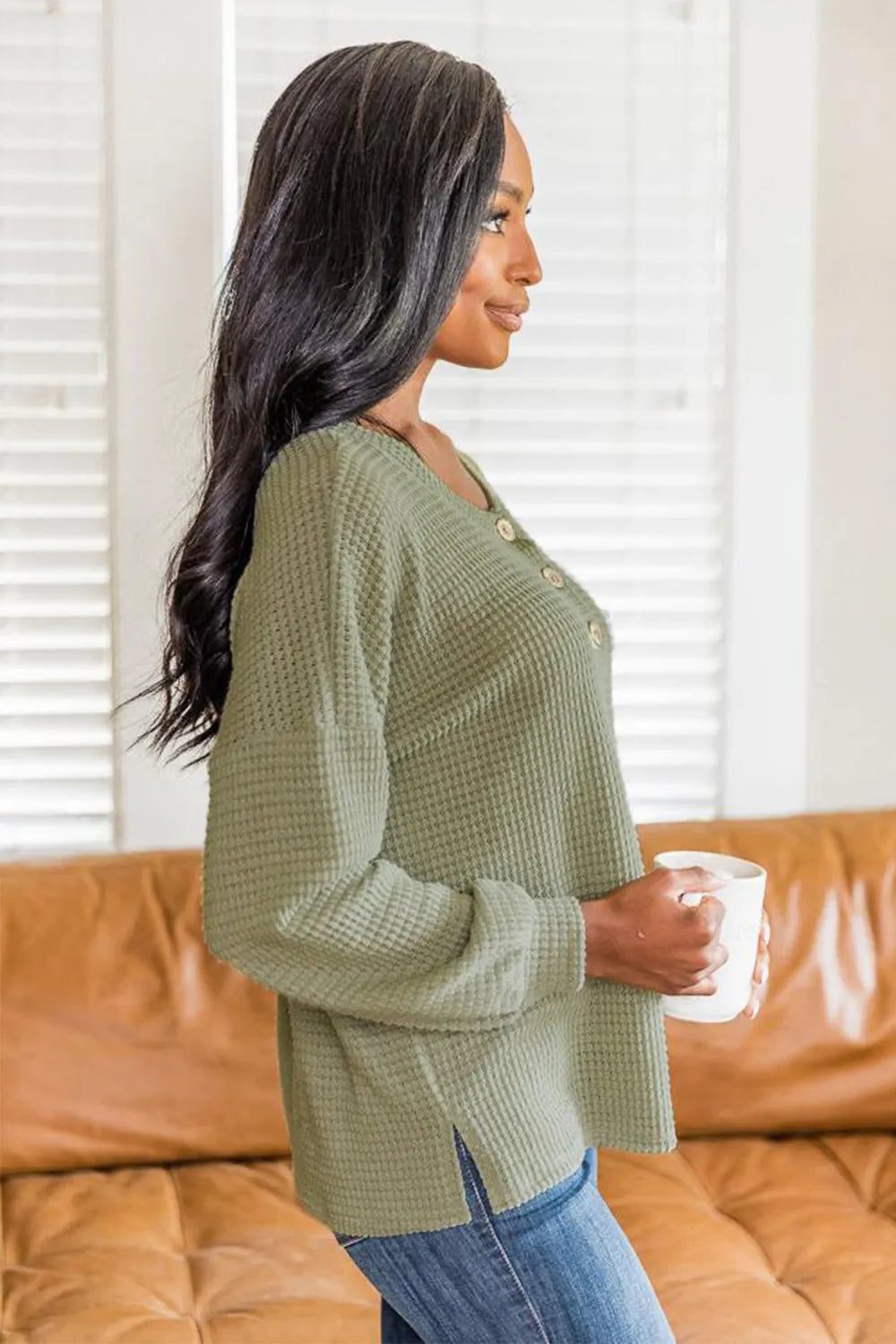 Matcha green waffle knit long sleeve henley top with button placket and curved hem