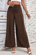 High-waisted wide-leg pants in dark brown with front pleat and belt loops.