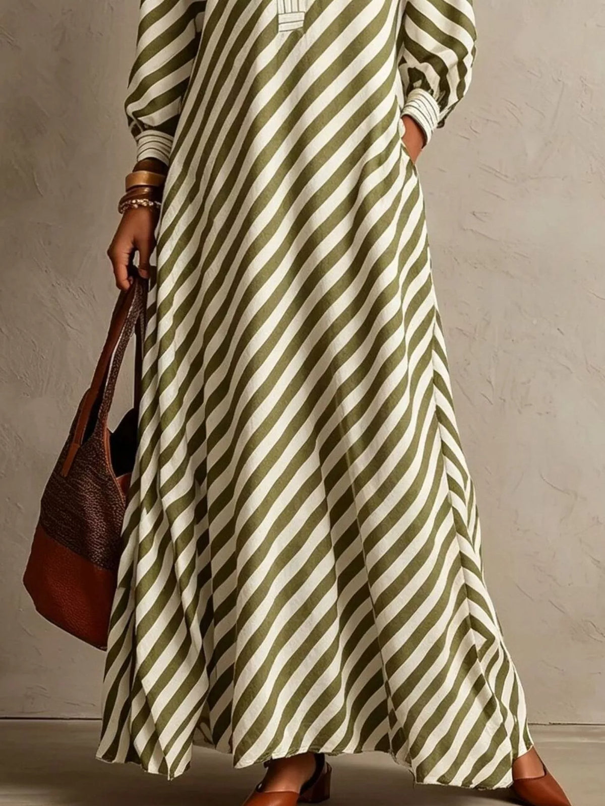 Sage-and-white striped maxi dress with draped skirt and V-neck