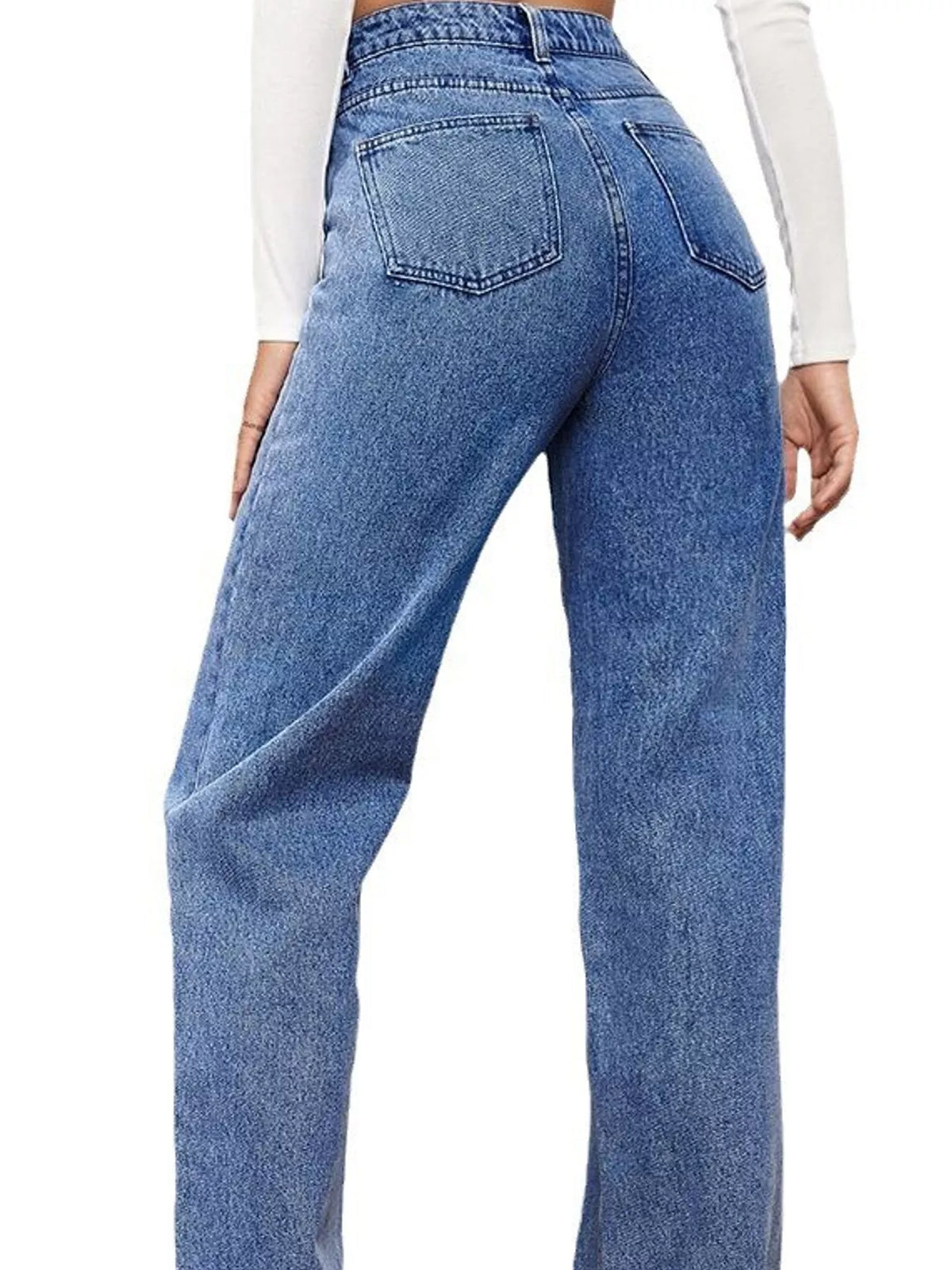 High-waisted vintage wash denim jeans with back pockets and wide straight leg