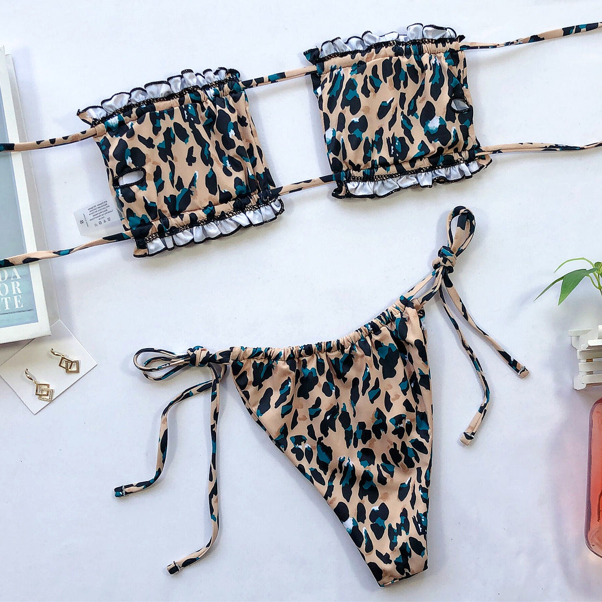 Leopard print ruched bandeau bikini top with matching side-tie bikini bottom set