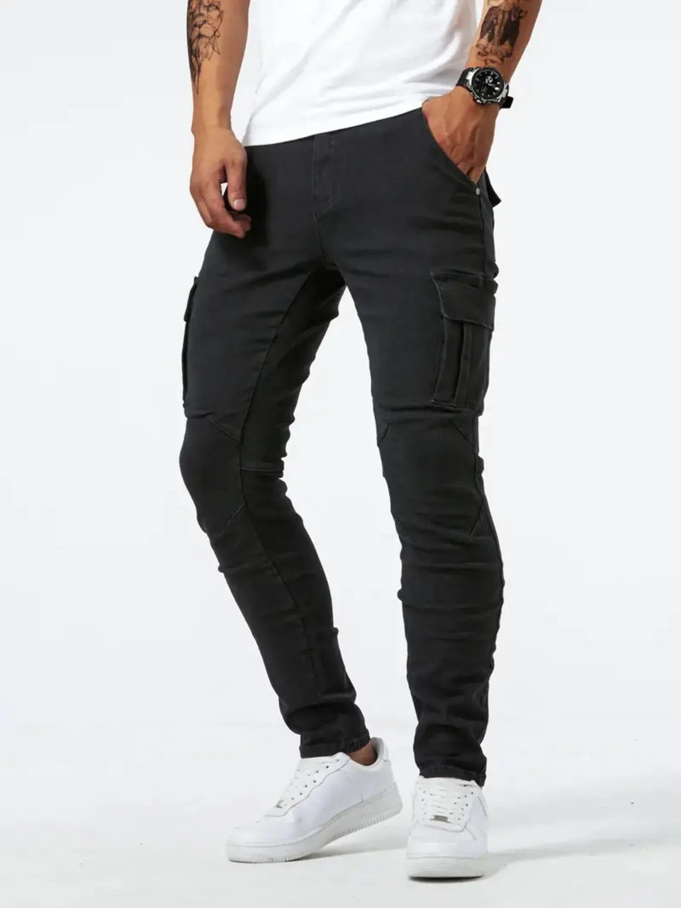 Black slim cargo jeans with side cargo pockets and zipper fly
