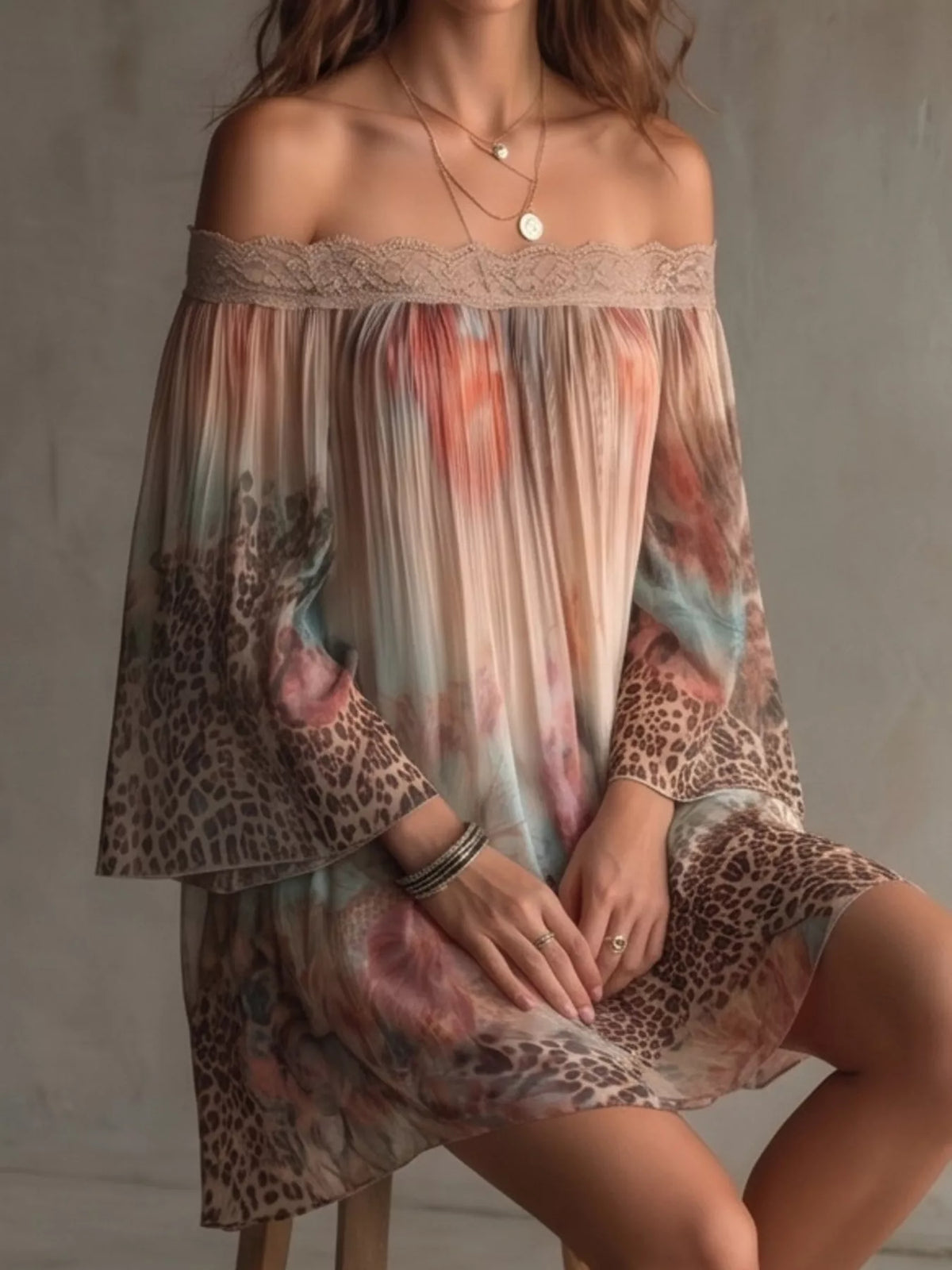Off-shoulder mini dress with lace trim, flared sheer sleeves, floral leopard print