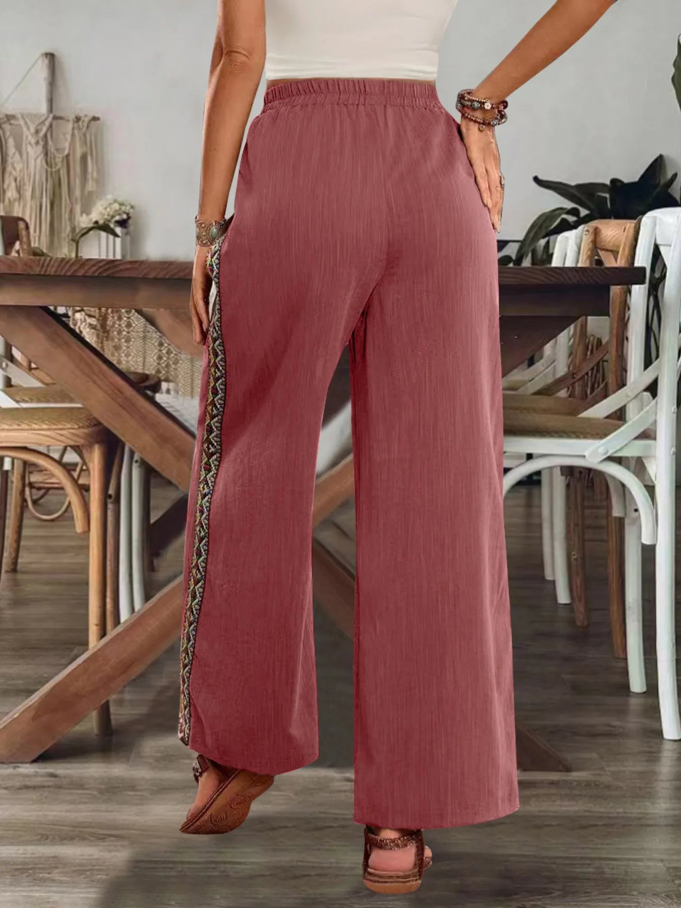 Dusty rose wide-leg pants with embroidered side stripe and elastic waistband