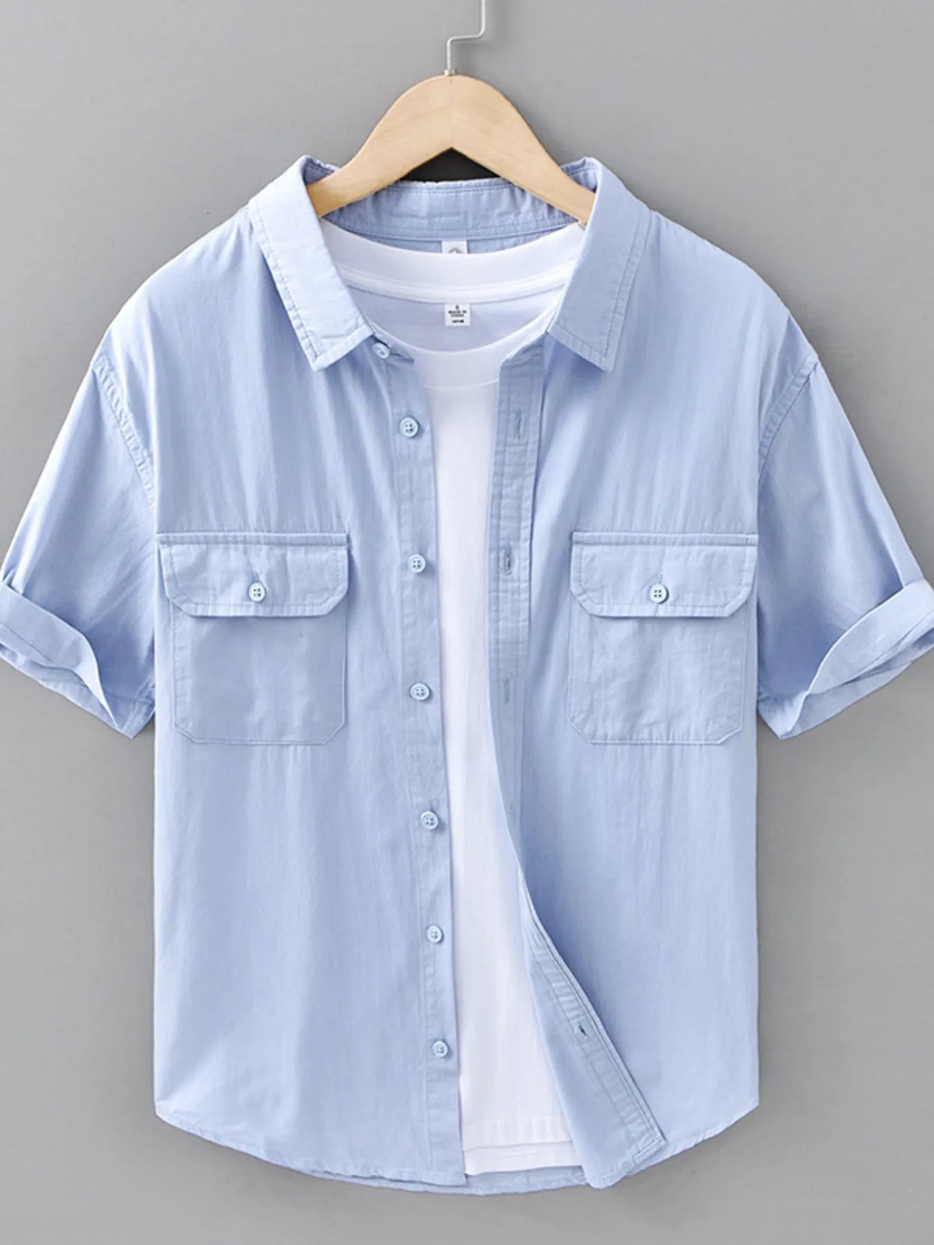 Light blue men's plus size short-sleeve button-up shirt with two chest pockets