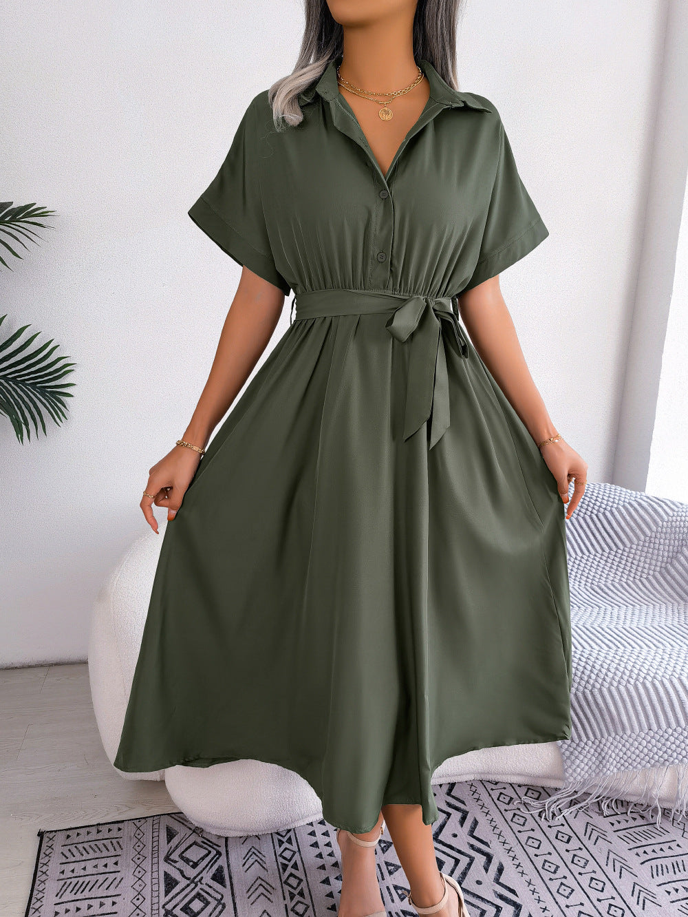 Army green short-sleeve collared tie belt dress with button front and midi flare