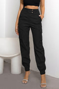 High-waist cargo pants, black with front button, side cargo pockets, tapered jogger cuffs
