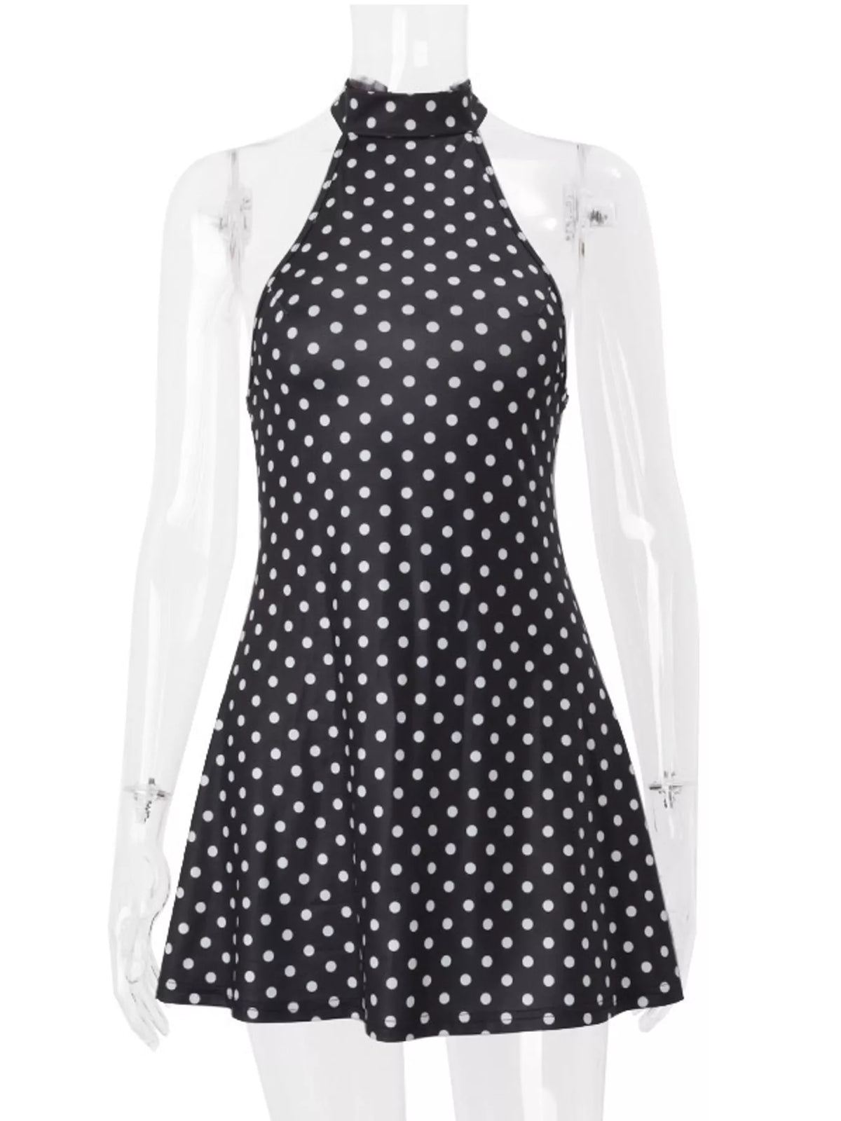 Black halter mini dress with white polka dots and flared skirt