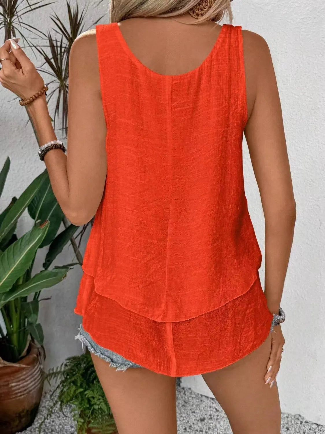 Orange layered tank top with wide straps, scoop back and tiered hem