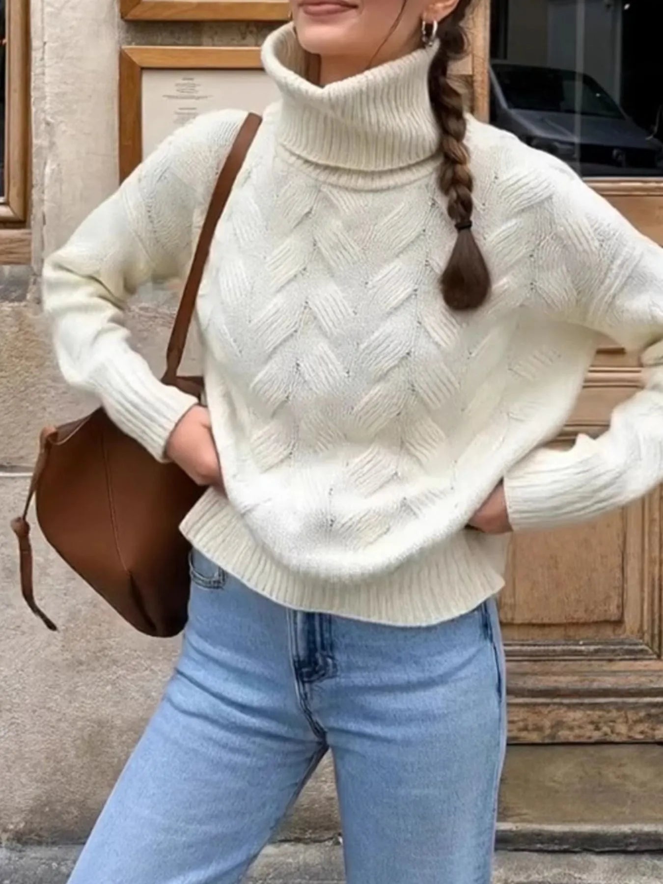 White turtleneck sweater with ribbed hem, long sleeves, zigzag cable knit