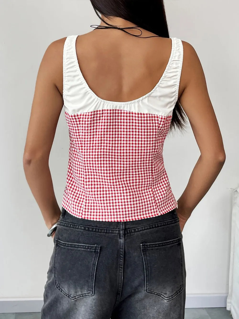 Back view of deep red and white gingham square-neck tank with white contrast trim