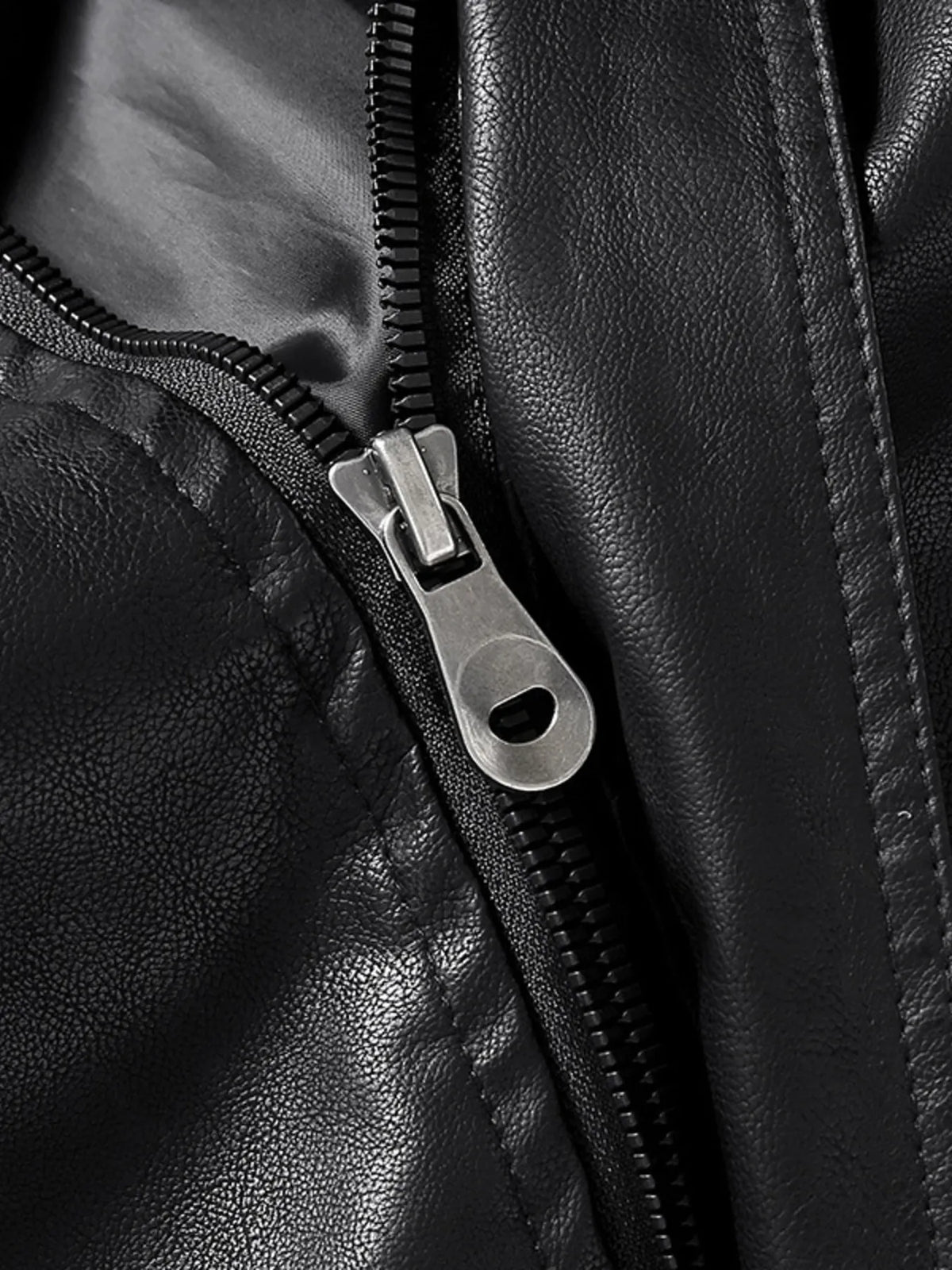 Men’s black zip-up vegan leather jacket front zipper with metal pull